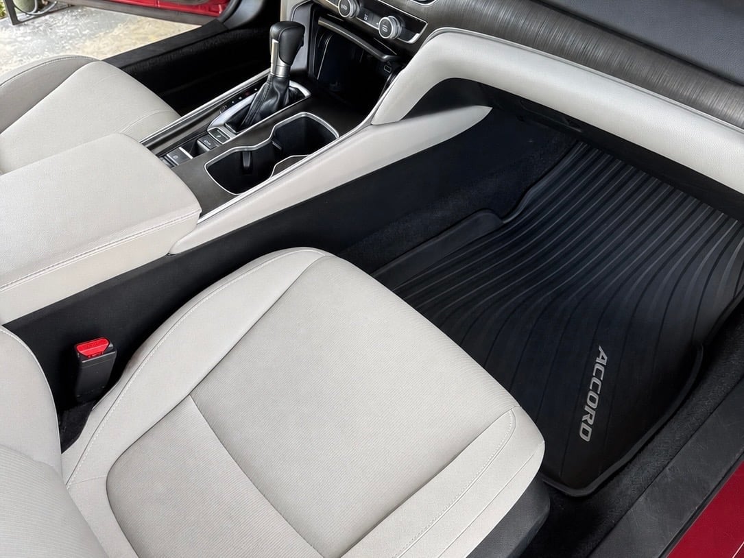 Interior detail of convertible car with white leather seats cleaned by mobile detailing service in Tampa Florida